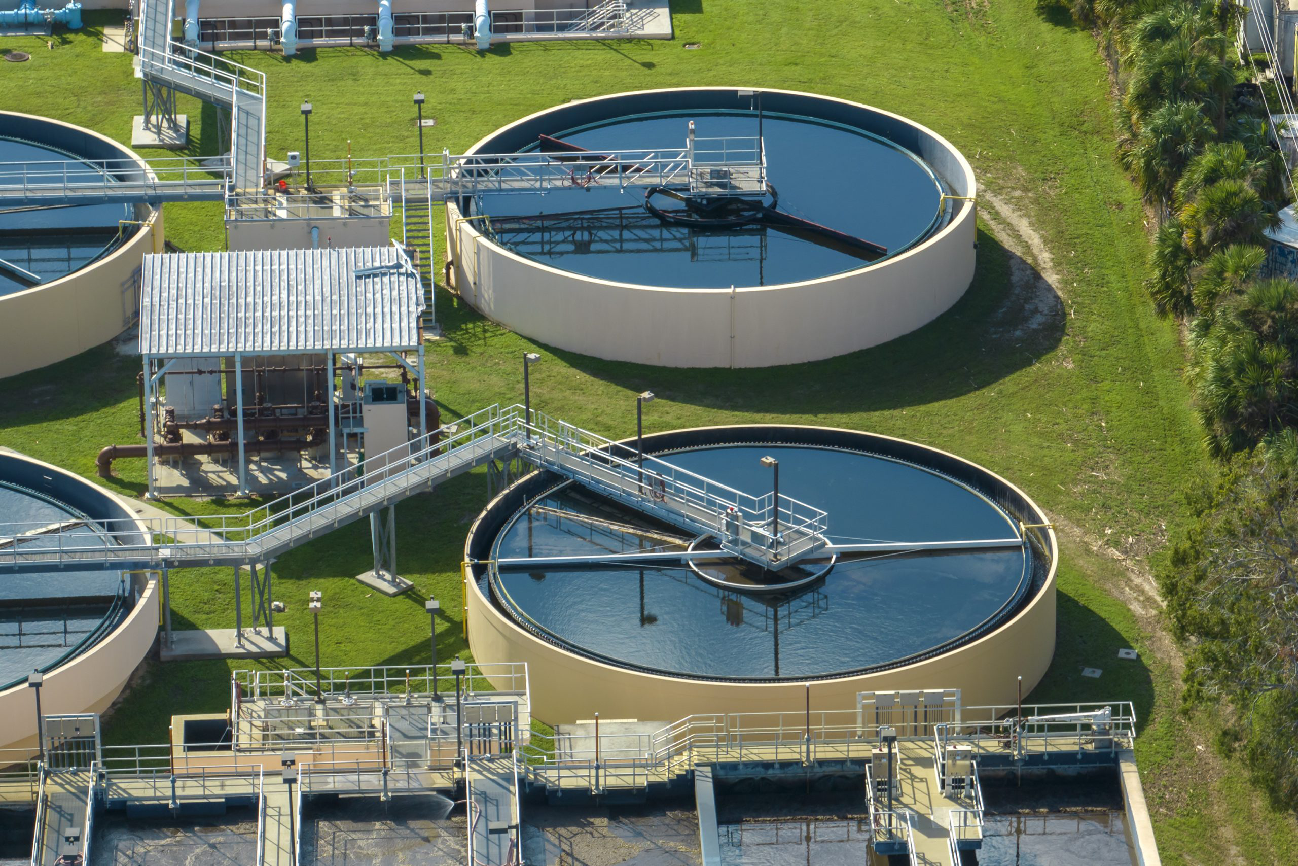 Aerial view of water treatment factory at city wastewater cleaning facility. Purification process of removing undesirable chemicals, suspended solids and gases from contaminated liquid