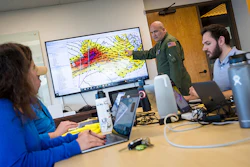 Storm data being reviewed on a large monitor in an office. | Photo by Scripps Institute of Oceanography
