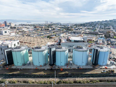 Birdseye view of the Biosolids Digesters Facilities Project and the Southeast Treatment Plant looking east.